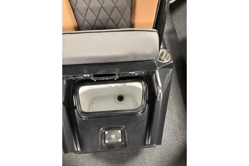 Slide: The Image of Interior view of 2027 Xpress H20 Bay boat, featuring a storage compartment and cushioned seating. - 10