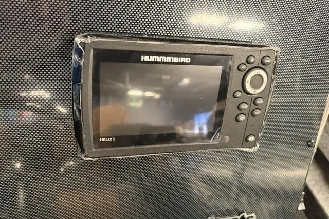 Slide: The Image of Humminbird Helix 5 fish finder on 2027 Xpress H20 Bay boat dashboard. - 13