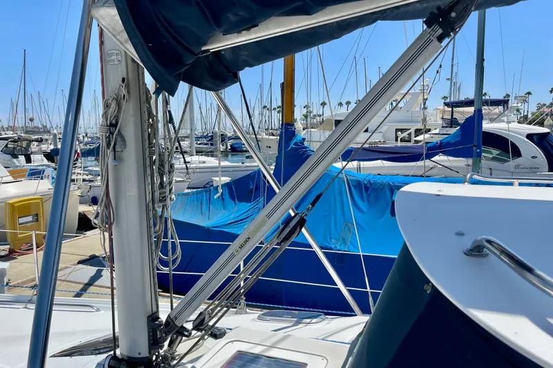 Slide: The Image of Sailboat mast and rigging of 1999 Hunter Passage 420 in marina setting. - 7