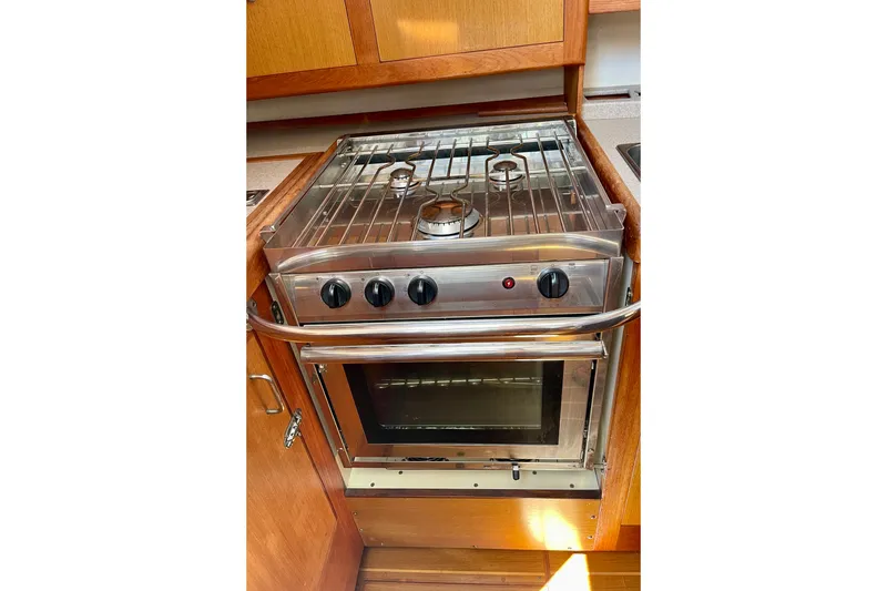 Slide: The Image of Stainless steel stove and oven in 1999 Hunter Passage 420 yacht kitchen. - 30