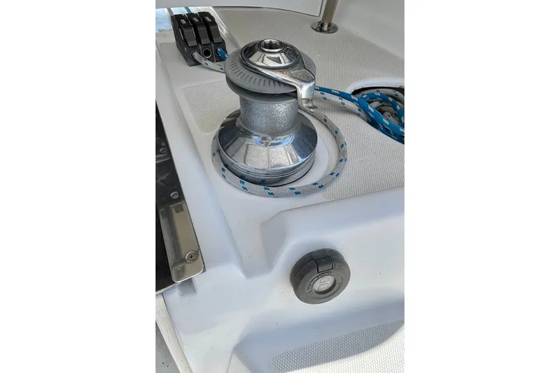 Slide: The Image of Winch and rope detail on 1999 Hunter Passage 420 sailboat deck. - 21