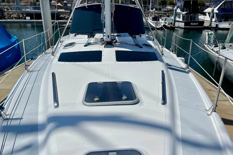Slide: The Image of Sailboat deck of 1999 Hunter Passage 420 docked at marina. - 10