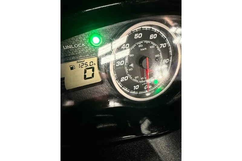 Slide: The Image of Close-up of 2014 Yamaha WaveRunner FX Cruiser HO dashboard with speedometer and digital display. - 10