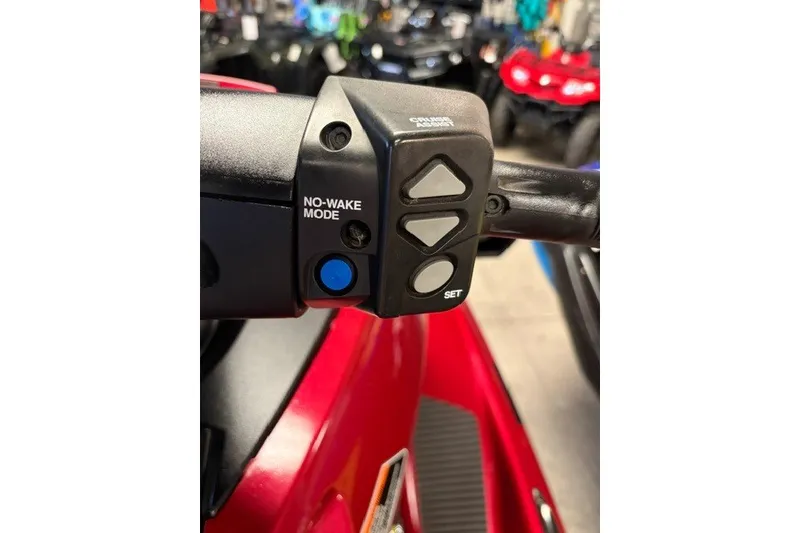 Slide: The Image of Close-up of 2014 Yamaha WaveRunner FX Cruiser HO controls, featuring no-wake mode button. - 8