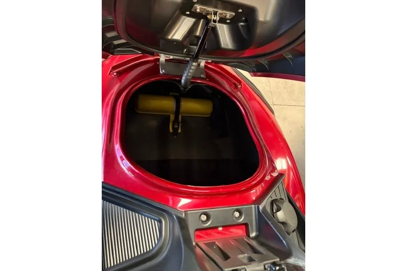 Slide: The Image of Open storage compartment of a 2014 Yamaha WaveRunner FX Cruiser HO, showcasing interior space. - 12