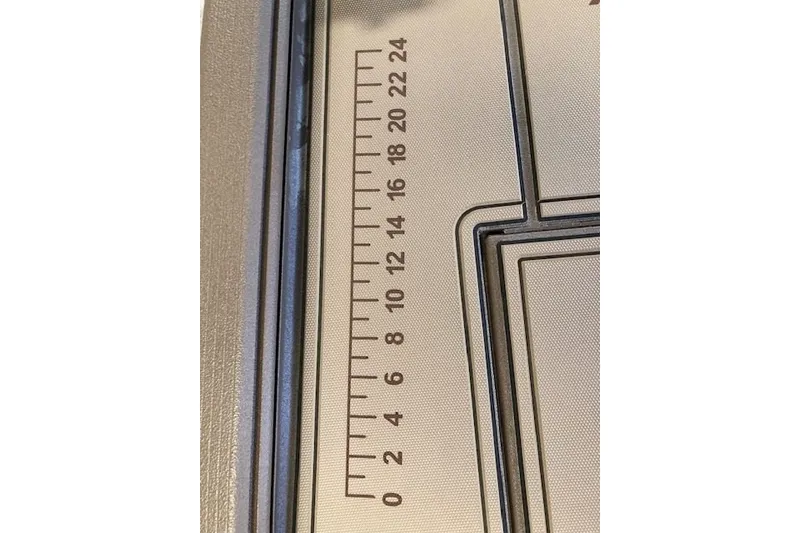 Slide: The Image of Ruler markings on Xpress Bayou 180CC boat deck, 2026 model. - 13