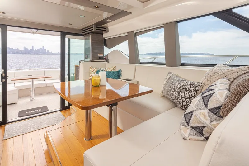 Slide: The Image of Luxurious interior of 2019 Tiara Yachts C44 Coupe with scenic ocean view. - 14