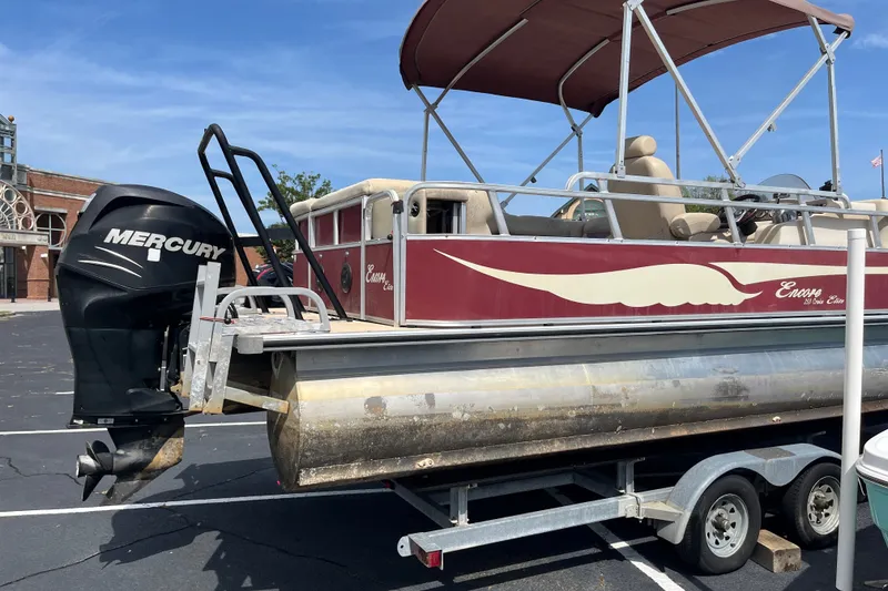 Slide: The Image of 2014 Bentley Pontoons Elite 250 on trailer with Mercury outboard motor. - 4