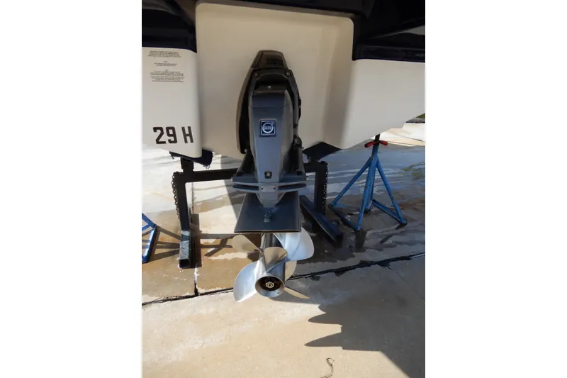 Slide: The Image of Rear view of 2017 Chaparral 246 SSi boat with visible propeller and outdrive. - 38