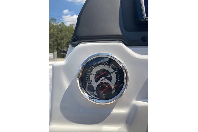 Slide: The Image of Tachometer on 2026 Xpress H20 Crappie boat dashboard under sunny sky. - 13