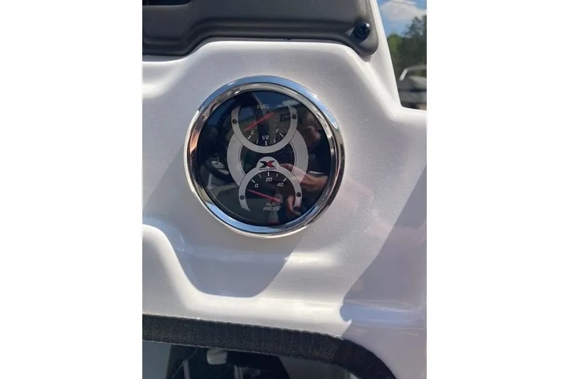 Slide: The Image of Gauge panel of 2026 Xpress H20 Crappie boat, displaying fuel and water pressure. - 14