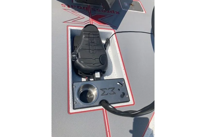 Slide: The Image of 2026 Xpress H20 Crappie boat deck with pedal and cable setup. - 20