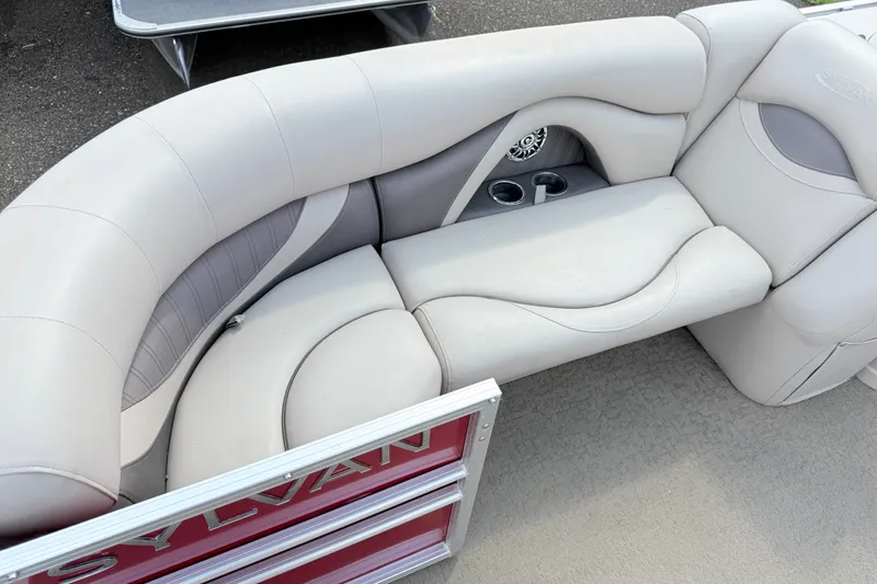 Slide: The Image of Luxurious seating on a 2016 Sylvan Mirage 8520 pontoon boat with cup holders. - 8