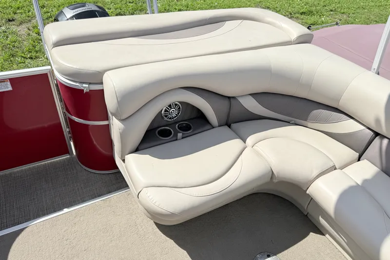 Slide: The Image of Luxurious seating on a 2016 Sylvan Mirage 8520 pontoon boat with cup holders and speaker. - 15