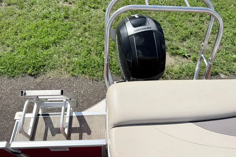 Slide: The Image of 2016 Sylvan Mirage 8520 boat with Mercury outboard motor and boarding ladder. - 18