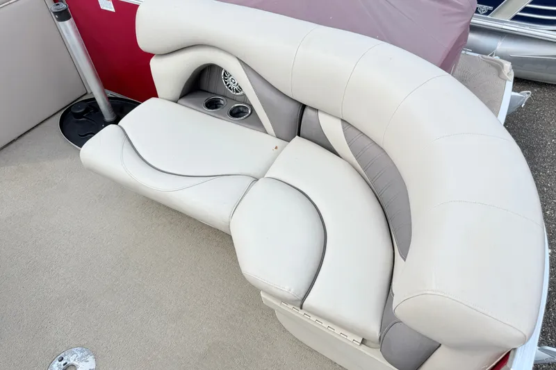 Slide: The Image of 2016 Sylvan Mirage 8520 boat seating with cup holders and speaker. - 5