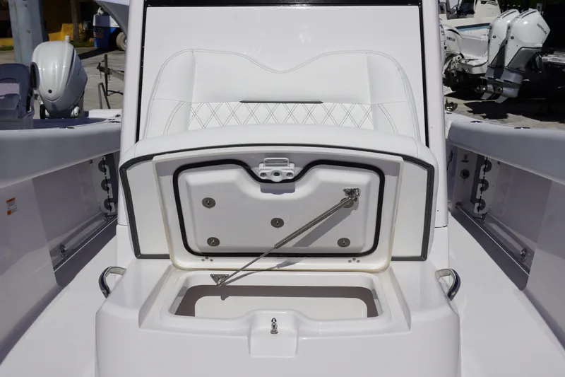 Slide: The Image of 2027 Sportsman Open 282 Center Console boat with open storage compartment. - 30