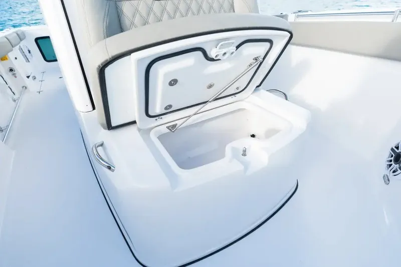 Slide: The Image of 2027 Sportsman Open 282 Center Console boat with open storage compartment. - 8