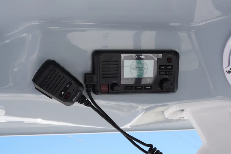 Slide: The Image of Garmin marine radio on 2027 Sportsman Open 282 Center Console boat. - 21