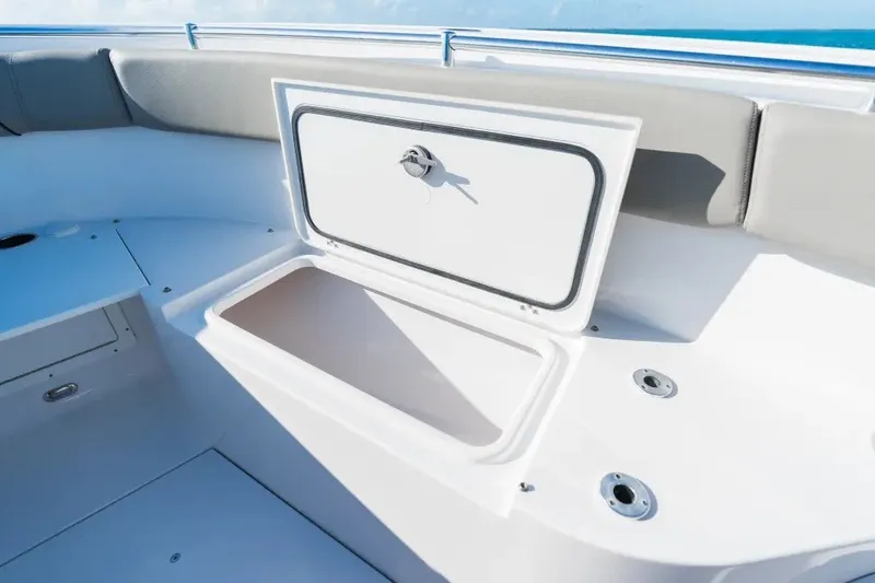 Slide: The Image of Open storage compartment on 2027 Sportsman Open 282 Center Console boat. - 4