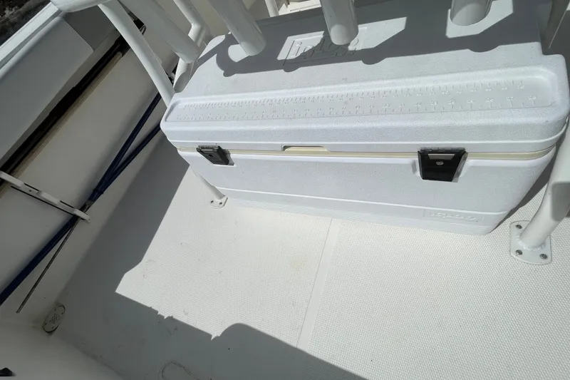 Slide: The Image of White cooler on 2023 Mako 214 Center Console boat deck. - 41