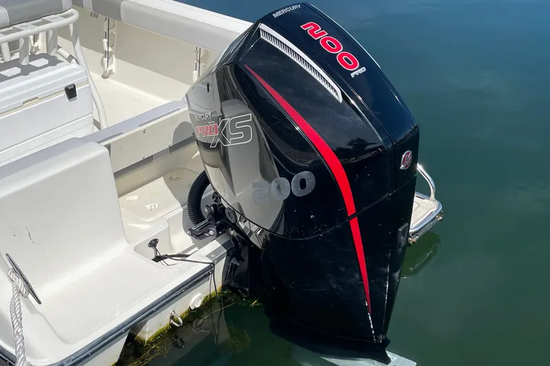 Slide: The Image of 2023 Mako 214 Center Console with Mercury Pro XS 200 outboard engine. - 16