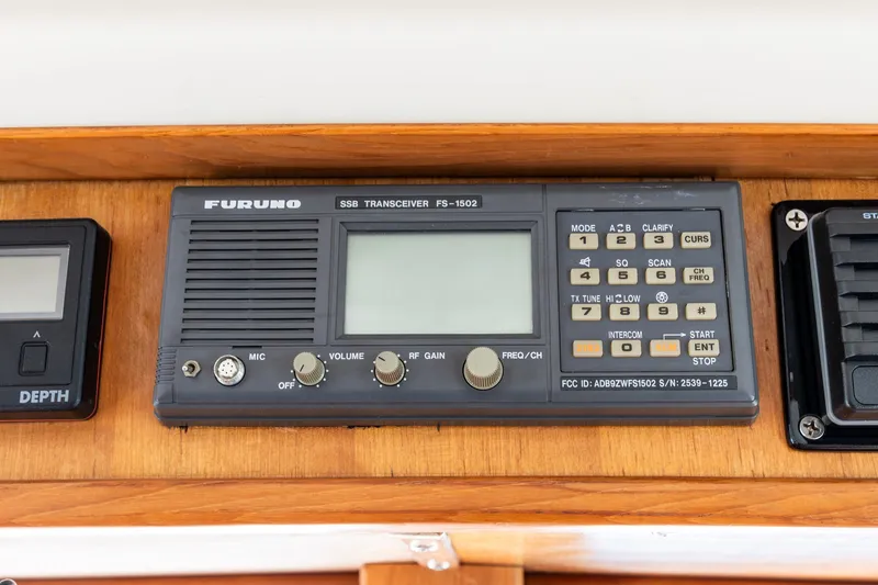 Slide: The Image of Furuno SSB transceiver FS-1502 on 1991 Kadey-Krogen 42 boat dashboard. - 35