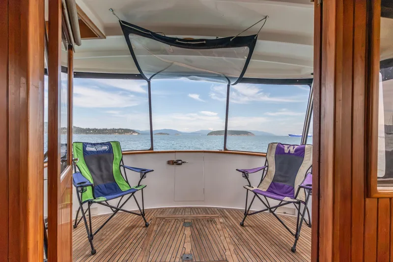 Slide: The Image of Interior view of 1991 Kadey-Krogen 42 yacht with ocean backdrop. - 26