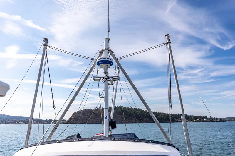 Slide: The Image of Kadey-Krogen 42 boat mast against a clear blue sky, 1991 model. - 48