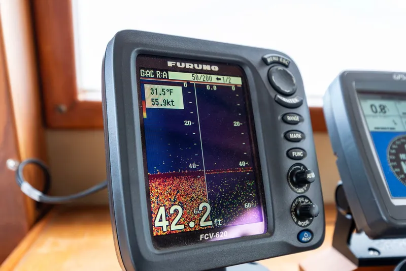 Slide: The Image of Furuno marine display on 1991 Kadey-Krogen 42, showing temperature and speed data. - 40
