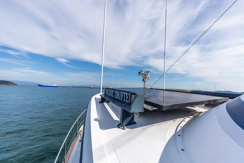 Slide: The Image of Kadey-Krogen 42 yacht, 1991 model, cruising on calm waters under a clear sky. - 52