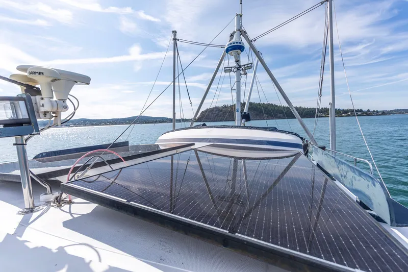 Slide: The Image of 1991 Kadey-Krogen 42 boat with solar panels and Garmin equipment on deck. - 47