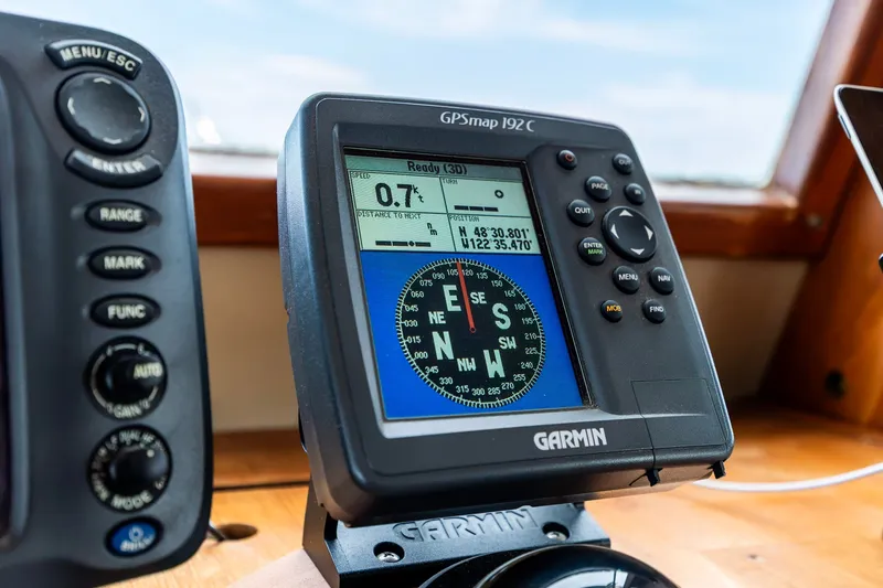 Slide: The Image of Garmin GPSmap 192C on 1991 Kadey-Krogen 42 boat, displaying navigation data. - 41