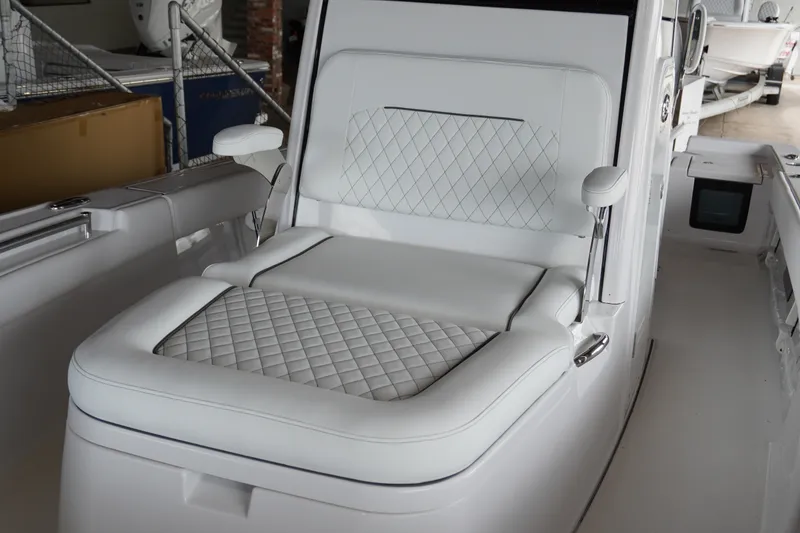 Slide: The Image of Luxurious seating on 2027 Sportsman Masters 247OE Bay Boat with quilted upholstery. - 15