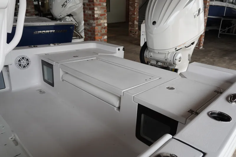 Slide: The Image of 2027 Sportsman Masters 247OE Bay Boat interior with Yamaha outboard motor. - 3