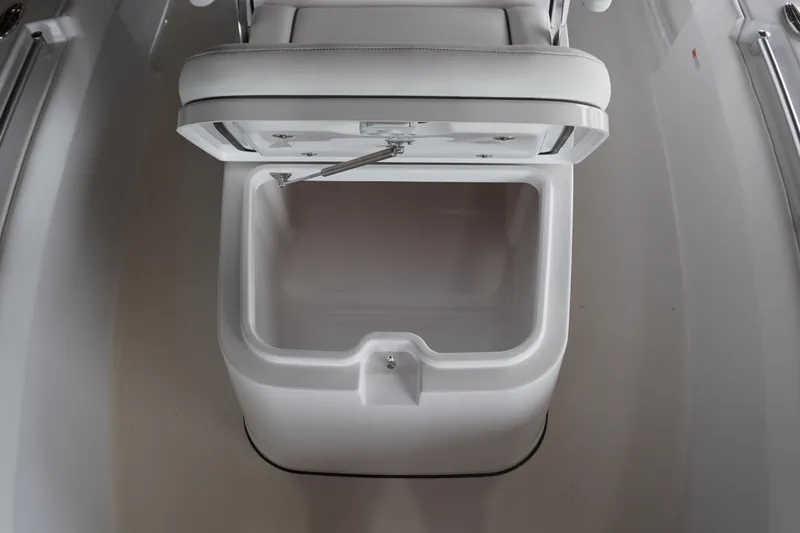 Slide: The Image of Open storage compartment on 2027 Sportsman Masters 247OE Bay Boat. - 16