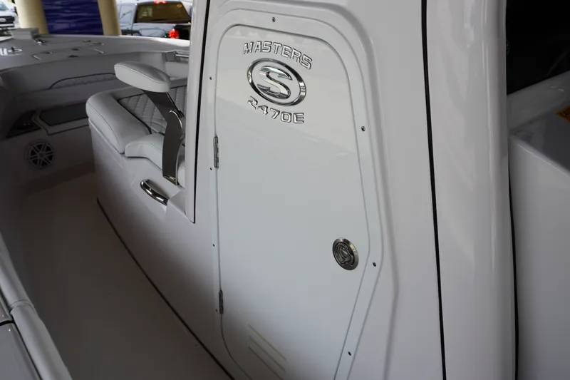 Slide: The Image of 2027 Sportsman Masters 247OE Bay Boat interior, featuring sleek seating and modern design elements. - 17