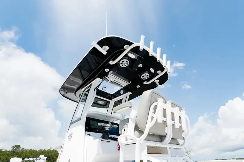 Slide: The Image of 2027 Sportsman Masters 247OE Bay Boat with sleek design and modern features. - 2