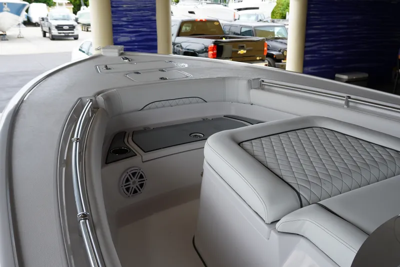 Slide: The Image of 2027 Sportsman Masters 247OE Bay Boat interior with sleek seating and modern design. - 12