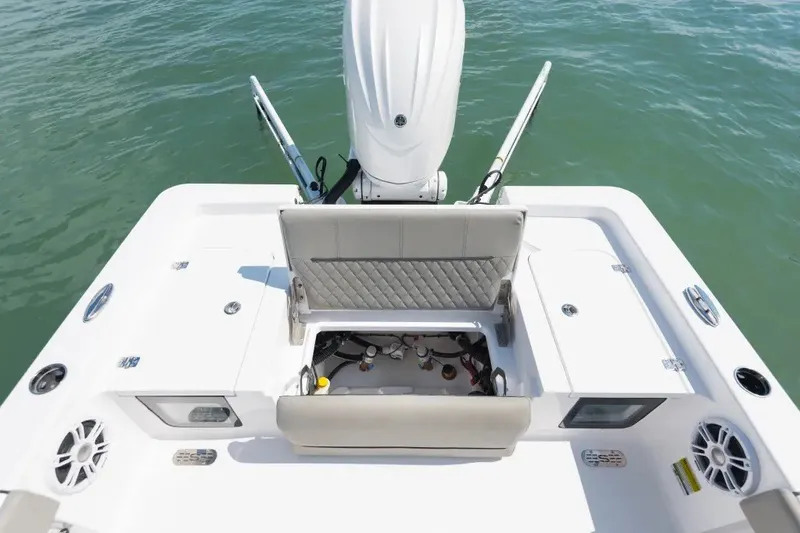 Slide: The Image of 2027 Sportsman Masters 247OE Bay Boat with open storage compartment on deck. - 5
