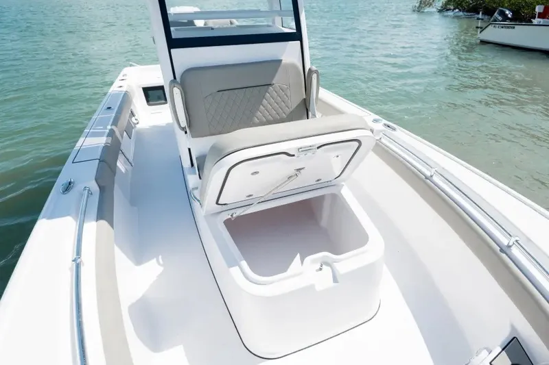 Slide: The Image of 2027 Sportsman Masters 247OE Bay Boat with open storage compartment on deck. - 9