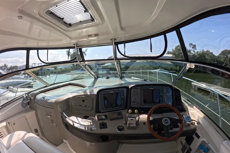 Slide: The Image of Cockpit view of 2007 Sea Ray 44 Sundancer yacht with modern navigation equipment. - 12