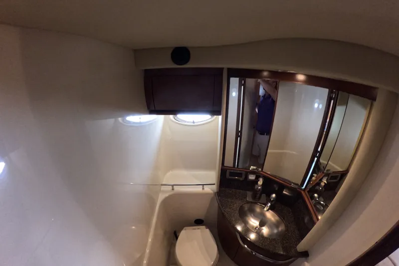 Slide: The Image of Luxurious bathroom in 2007 Sea Ray 44 Sundancer yacht with modern fixtures and elegant design. - 63