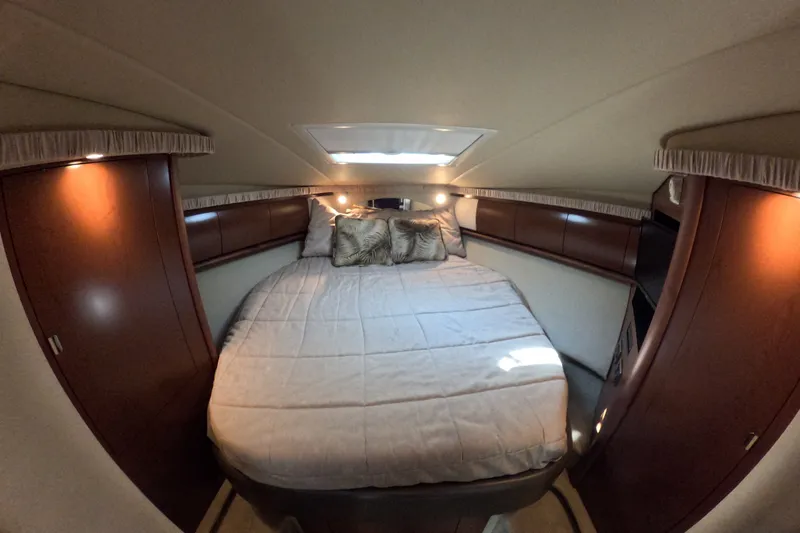 Slide: The Image of Luxurious cabin interior of 2007 Sea Ray 44 Sundancer yacht with cozy bedding. - 58