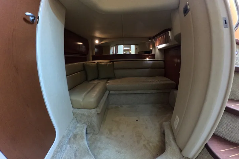 Slide: The Image of Interior of 2007 Sea Ray 44 Sundancer yacht, featuring a cozy seating area. - 69