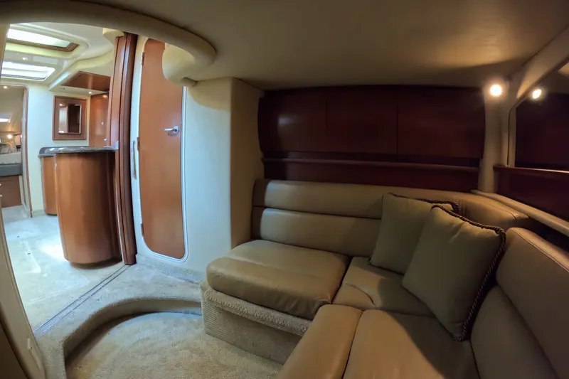 Slide: The Image of Luxurious interior of 2007 Sea Ray 44 Sundancer yacht with plush seating and elegant wood finishes. - 45