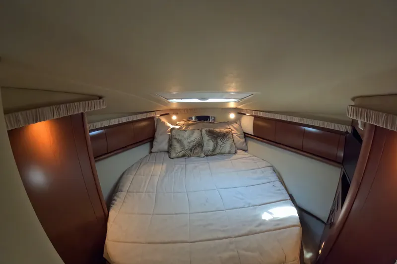 Slide: The Image of Luxurious cabin interior of 2007 Sea Ray 44 Sundancer yacht with cozy bedding. - 33
