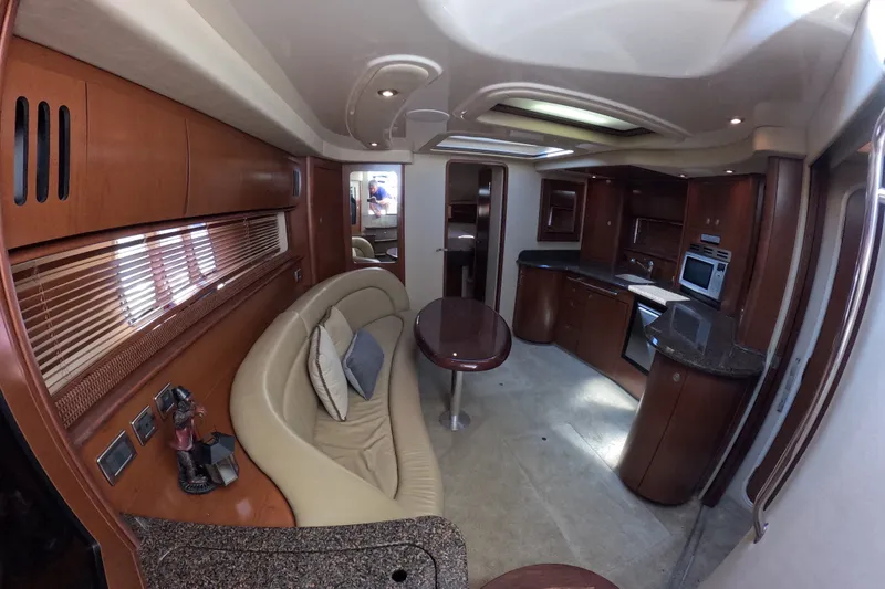 Slide: The Image of Luxurious interior of a 2007 Sea Ray 44 Sundancer yacht with elegant wood finishes. - 51