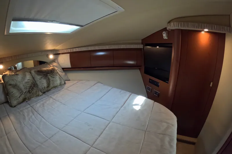 Slide: The Image of Luxurious cabin interior of 2007 Sea Ray 44 Sundancer yacht with cozy bedding and modern amenities. - 35