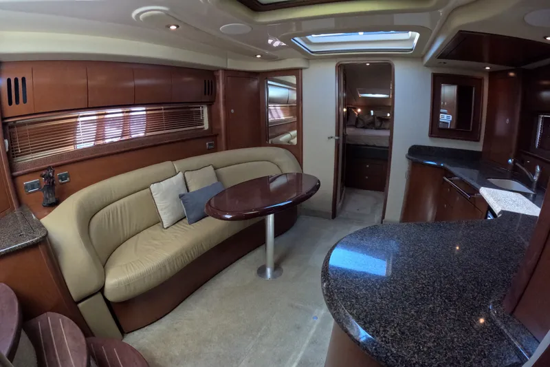 Slide: The Image of Luxurious interior of a 2007 Sea Ray 44 Sundancer yacht with elegant seating and modern amenities. - 28